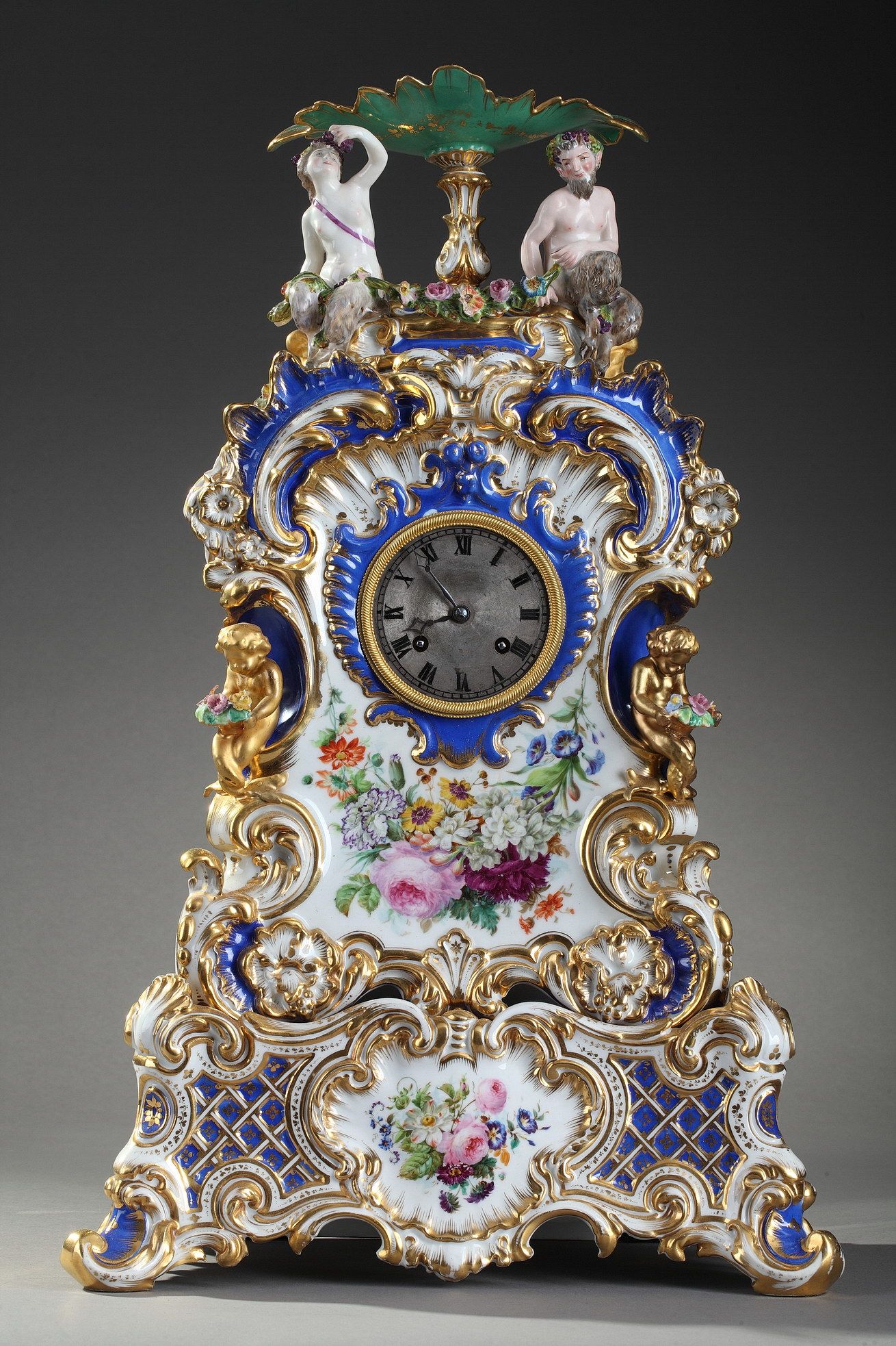 CLOCK IN PORCELAIN IN THE STYLE OF JACOB PETIT (1796-1865) 