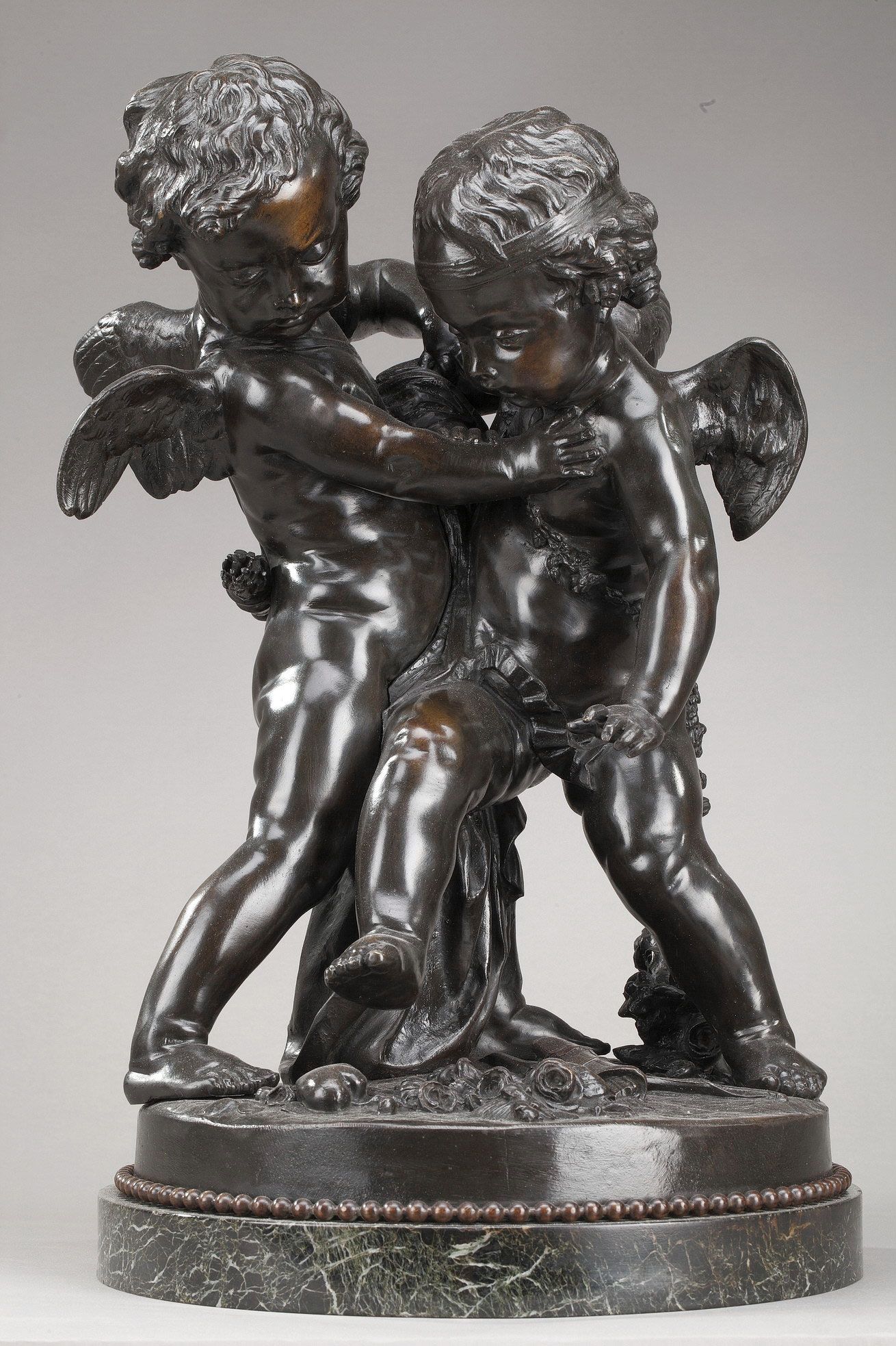 two lovers fighting over a heart, falconet
