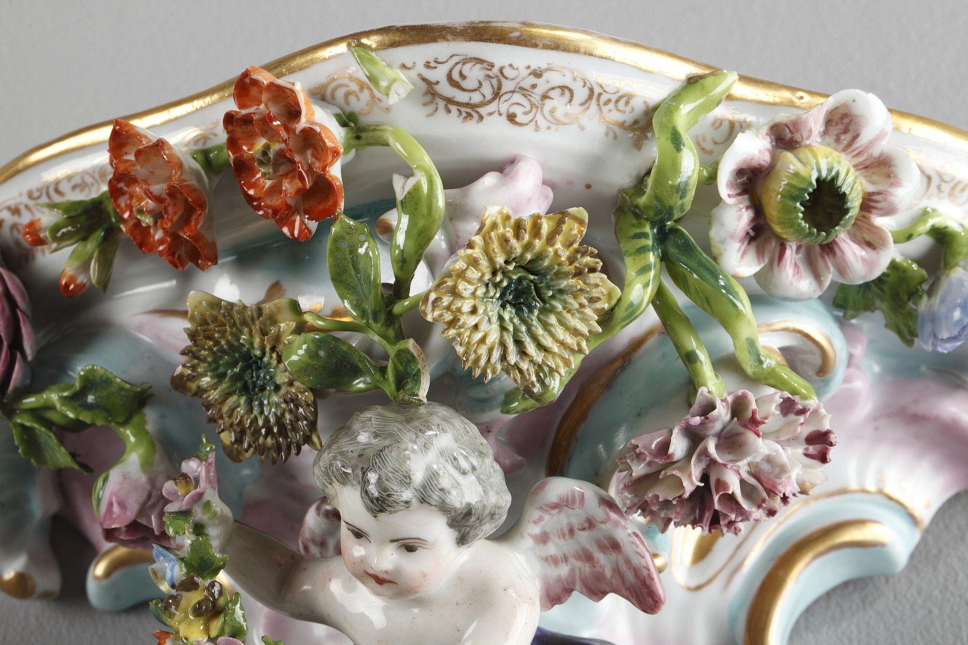 PAIR OF SMALL ROCAILLE CONSOLES IN THE STYLE OF THE MEISSEN FACTORY